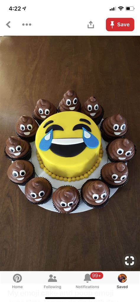 Time For Some Fun A Laughing Emoji Cake Surrounded By Poo Emoji