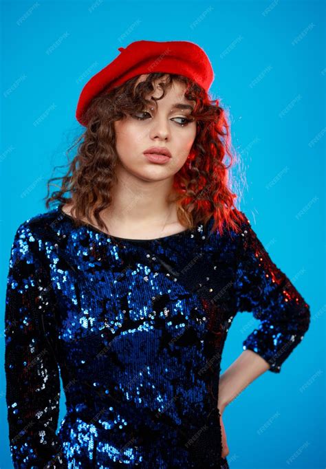 Premium Photo Young Curly Haired Girl On Blue Background Adorable