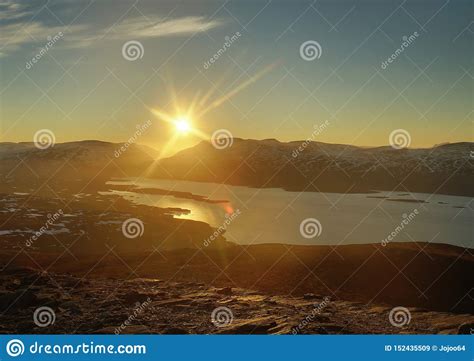 Hdr Of Midnight Sun Seen From The Peak Of Nuolja In Northern Sweden