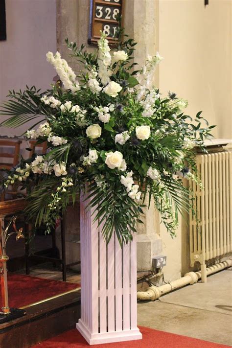 Maybe you would like to learn more about one of these? white pedestal arrangement | Broadview Florist: Emma and ...