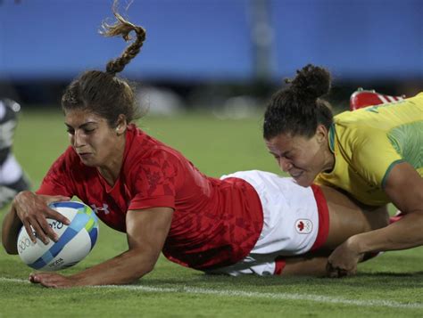 Canada S Bianca Farella Scores A Try As She Is Tackled By Mariana Ramalho Of Brazil Women S