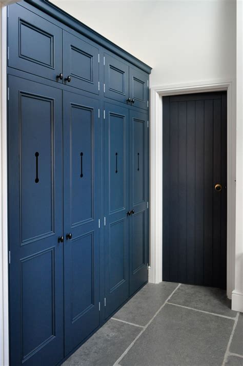 A Built In Hallway Cupboard For Coats Shoes Vacuum Cleaner Painted