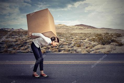 Woman Carrying Heavy Load