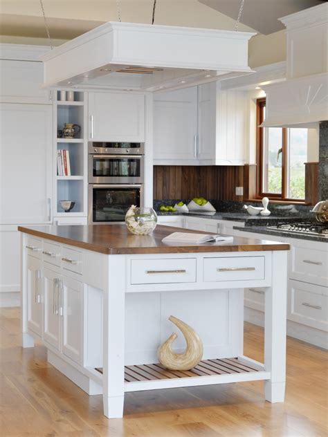If you're short on kitchen cabinet space, consider taking some items out of your cabinets and glass cabinet doors can be a beautiful component of kitchen cabinetry. Best Stand Alone Kitchen Islands - HomesFeed