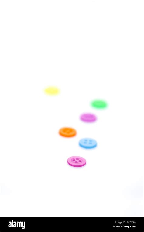 Colourful Buttons Spread Out On A White Background Stock Photo Alamy