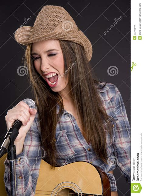 Country Western Singer Playing Guitar Singing Song Stock