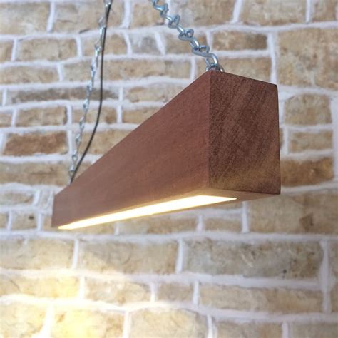 Farmhouse industrial wood beam linear hanging ceiling balk fixture wrapped light. How to combine Wood and Modern Beam... • iD Lights