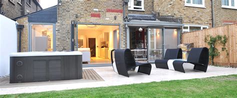 You can position a hot tub anywhere in the garden. Hot Tub Garden Design London | Bamboo Landscaping
