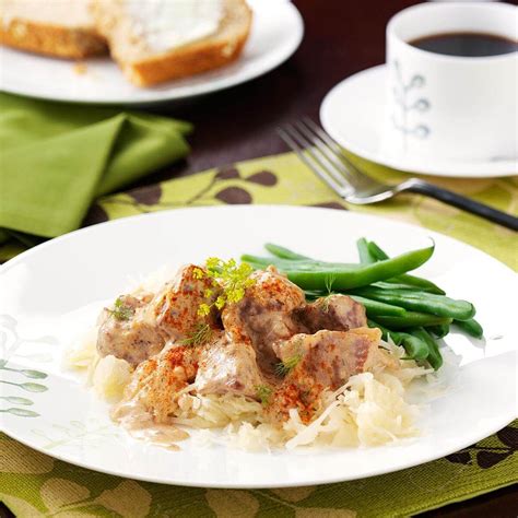 This beef tenderloin dinner stars beef tenderloin, which is accompanied by garlic mashed potatoes, green beans amandine, and pecan pie. Bohemian Beef Dinner Recipe | Taste of Home