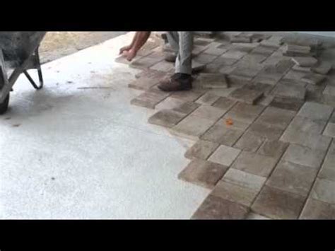 Pavers over concrete using brock paverbase is simpler and faster. Laying Thin Pavers Over Concrete - YouTube