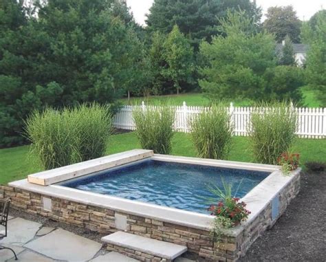 A Partially In Ground Endless Pool Waterwell Serves As The Garden Plunge Pool Small Backyard