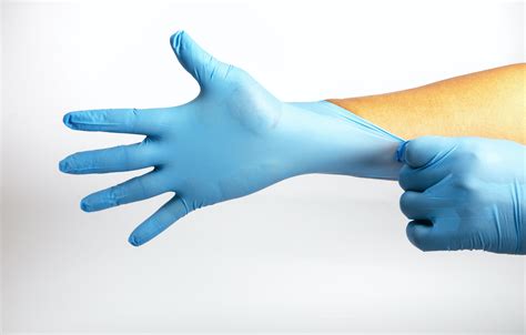 Human Holding Variation Of Latex Glove Rubber Glove Manufacturing