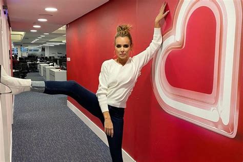 Amanda Holden Flaunts Flexibility With Raunchy Pose Amid Speculation Over Frozen Face Mirror