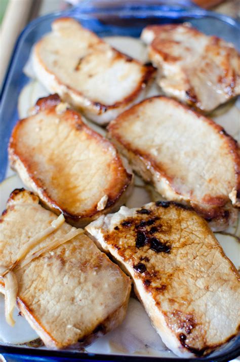 Sprinkle pork chops with pepper; Smothered Pork Chop Scalloped Potato Casserole!