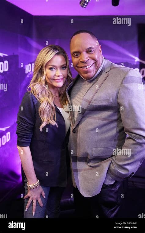 Actress Denise Richards And Tv Host Tyrone Jackson On The Set Of Hot In