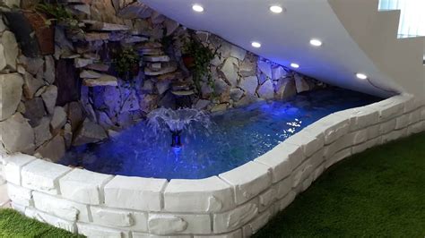 We have a beautiful water feature fountain which we fill using our drip line. Duplex House water Fountain | Under Stair Water Fountain ...