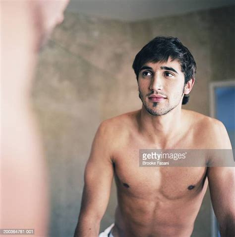 confident male mirror photos and premium high res pictures getty images