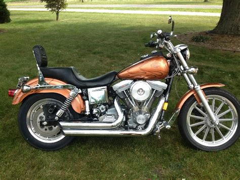 These stripped down cruisers boast raw custom style, big v. 1997 Harley-Davidson® FXD Dyna® Super Glide® (Burnt Orange ...
