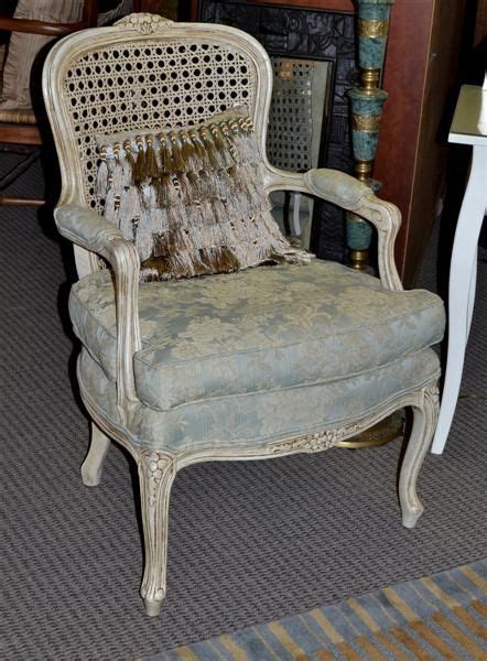 The paired with the soft fabric makes for a neutral color palette that looks great in a variety of settings. Beautiful White Cane back chair with blur floral print ...