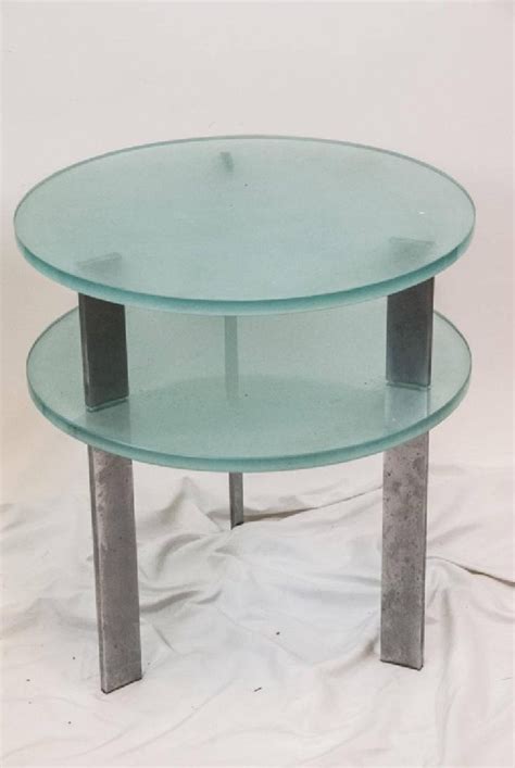 Stylish end tables, artfully placed, can really enhance your living room look, and our glass side tables are some of the most gorgeous around. Pair of Modern Two-Tier Glass Side Tables For Sale at 1stDibs