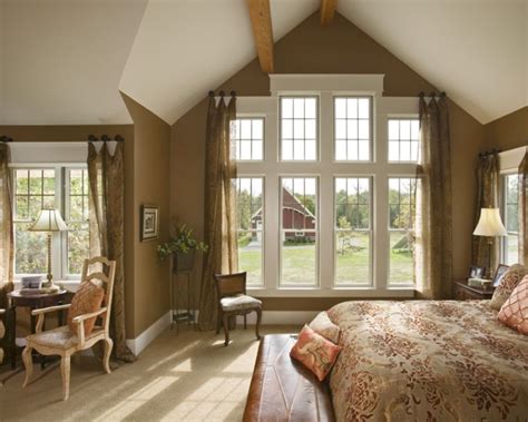A classy bedroom featuring a vaulted ceiling with exposed beams and elegant carpet flooring. Modern vaulted ceiling master bedroom ideas giving warm ...
