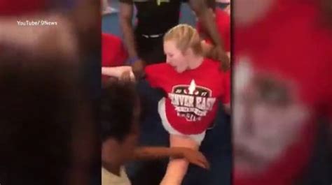 Coach Filmed Forcing Cheerleader Into Splits Will Not Face Charges