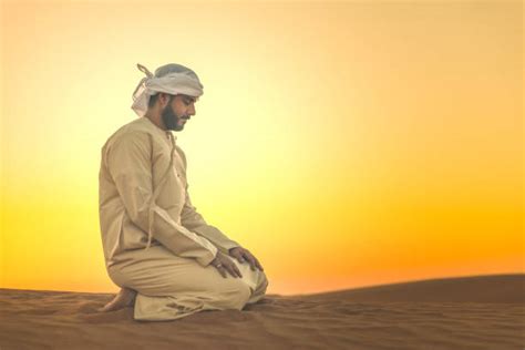 Arabic Man Praying In The Desert Stock Photos Pictures And Royalty Free