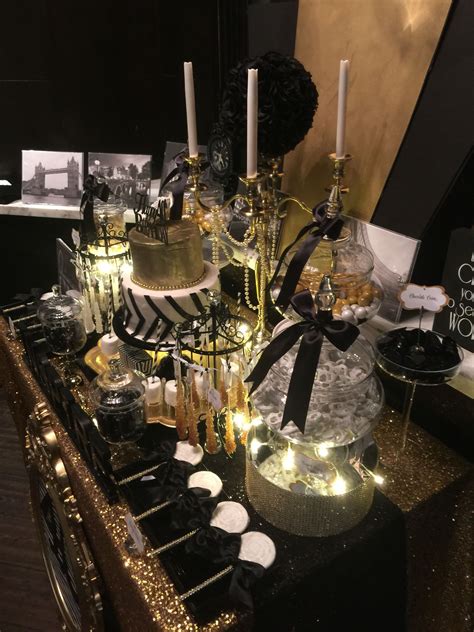 Black, White and Gold Candy Buffet with a Glamorous 2-tier fondant cake