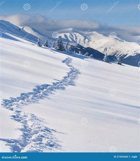 Trail In The Snow Covered Mountains Stock Photo Image Of Bright
