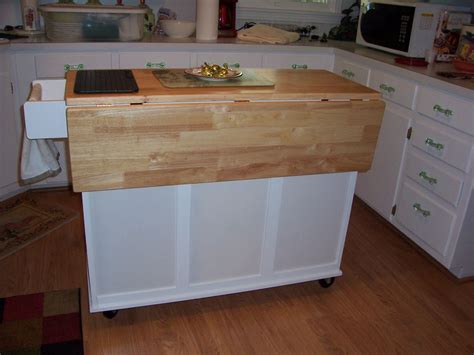 A kitchen island is always a useful item to have but a drop leaf kitchen island is even handier. Kitchen island with Folding Leaf - Kitchen Design Ideas ...