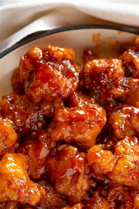 Place water, honey, orange juice, soy sauce, garlic, orange zest, ginger, and pepper flakes to a medium saucepan. Baked Orange Chicken made with Panda Express Orange ...