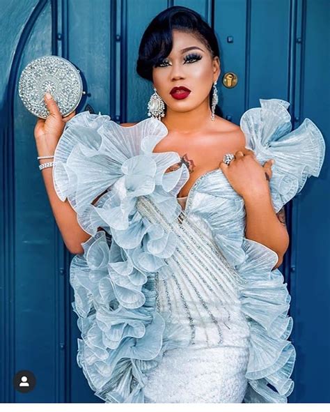 Her outfit however had high slits that went up to her privates. Toyin Lawani Brags About Her Style As She Flaunts Singer Okiemute