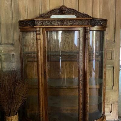 Product description curio cabinet (950170) materials: Antique Horner Brothers Lion Head, Claw feet, Bowed Glass ...