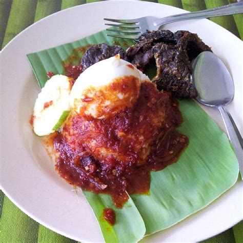 Nasi lemak is a dish originating in malay cuisine that consists of fragrant rice cooked in coconut milk and pandan leaf. Nasi Lemak Saleha@Kampung Pandan - Kampung Pandan - 60 tips