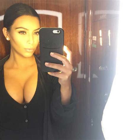 Kim Kardashian Shows Massive Cleavage In Sexy Selfie On Plane Pic E