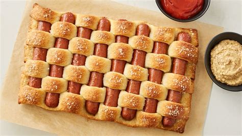 On a greased surface, divide the dough into 10 equal portions. Pretzel Woven Hot Dogs Recipe - Tablespoon.com