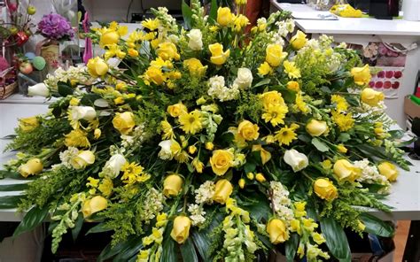 Yellow And White Casket Spray In Yorba Linda CA Everblooming Floral