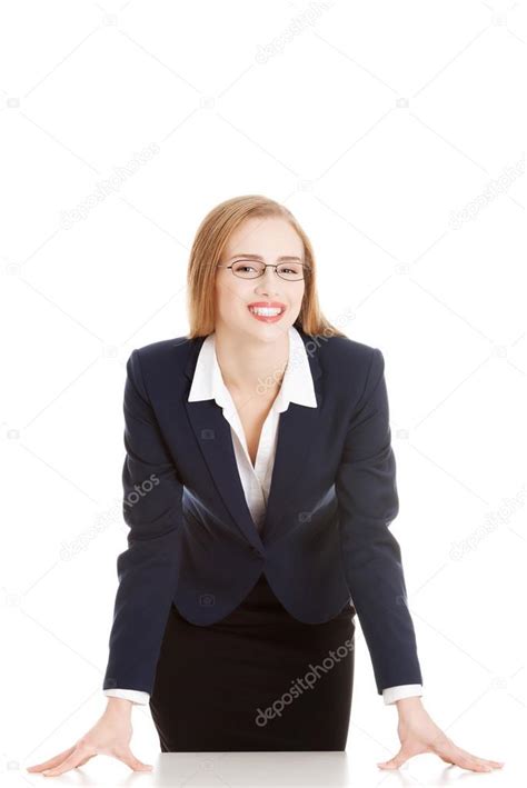 Beautiful Business Woman Bending Over Table Stock Photo By ©piotr