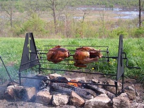 cooking fire meat spit campfire pit iron cast using cowboy grill roasting roast open equipment outdoor whole bbq food gear