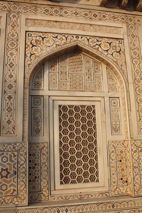 An Intricately Carved Window Arch Photo