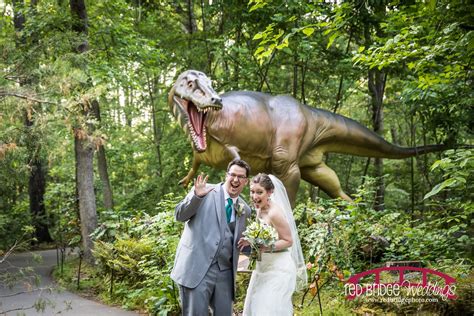 Dinosaur wedding photographs have become the latest wedding craze. Red Bridge Photography - Vivian & Edward's Wedding at Museum of Life and Science - Dinosaurs!
