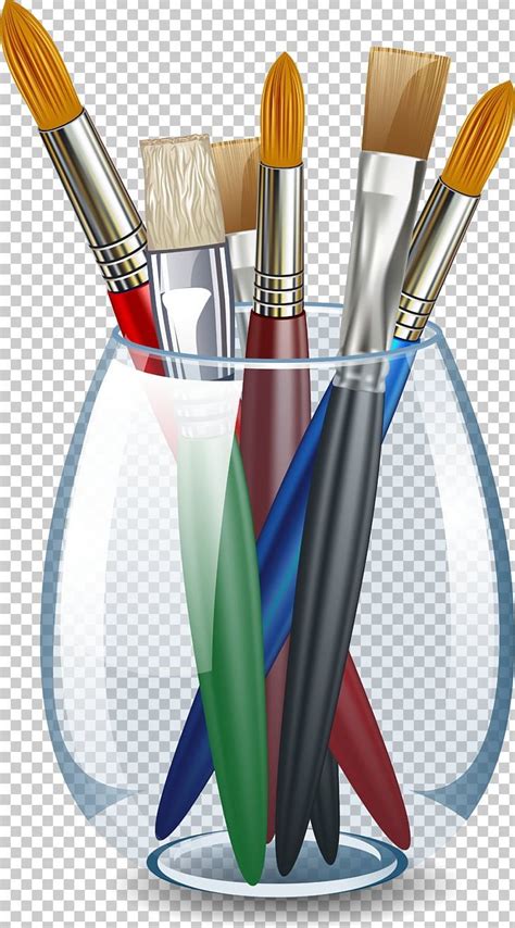 A Glass Filled With Different Types Of Paint Brushes