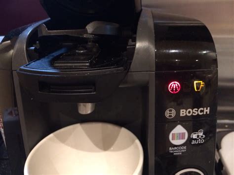 And the red light won't turn off, even tho you followed the descaling instructions in the manual? Bosch Tassimo Coffee Machine Two Red Lights - Shelly Lighting