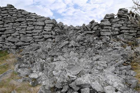 Broken High Stone Wall — Stock Photo © Morrbyte 9412569