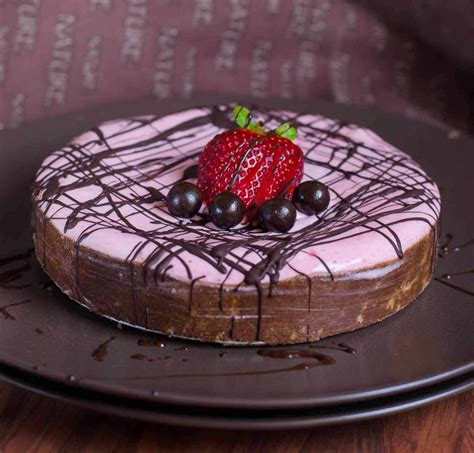 A Twist To Your Usual Cheese Tart No Bake Poha And Millets Chocolate Tart With Strawberry Cheese