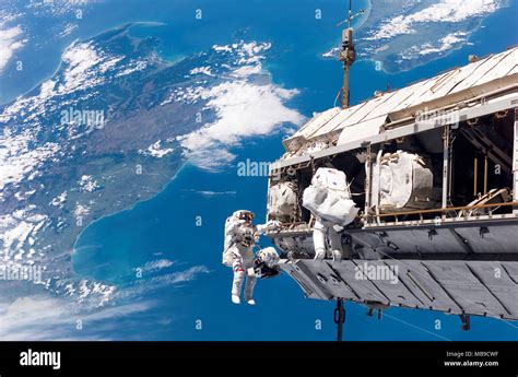 International Space Station Astronauts Working On The Constuction Of