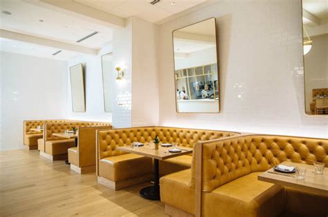 A multifunctional set comprising 2 chairs and a table, suitable for both indoor and outdoor entertaining areas. Meet City Hall Bistroa at a New Mid-Century Modern Hotel