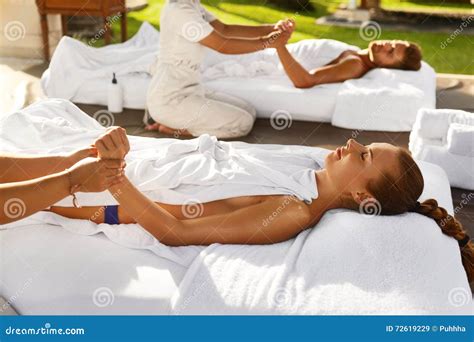 Spa Massage Couple Enjoying Relaxing Hand Massage Outdoors Stock Image