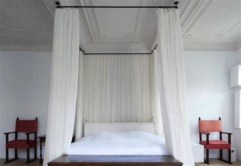 Canopy bed curtains could very easily and completely shroud the bed as an enclosure. DIY Canopy Bed - 5 You Can Make - Bob Vila