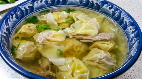 Closeup Of Freshly Prepared Bowl Of Chinese Dumplings Soup Stock Photo
